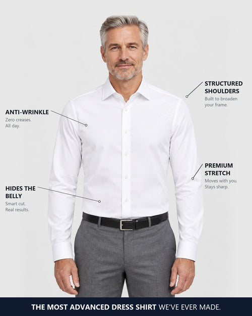 The Selorna non-iron dress shirt in white, worn tucked in