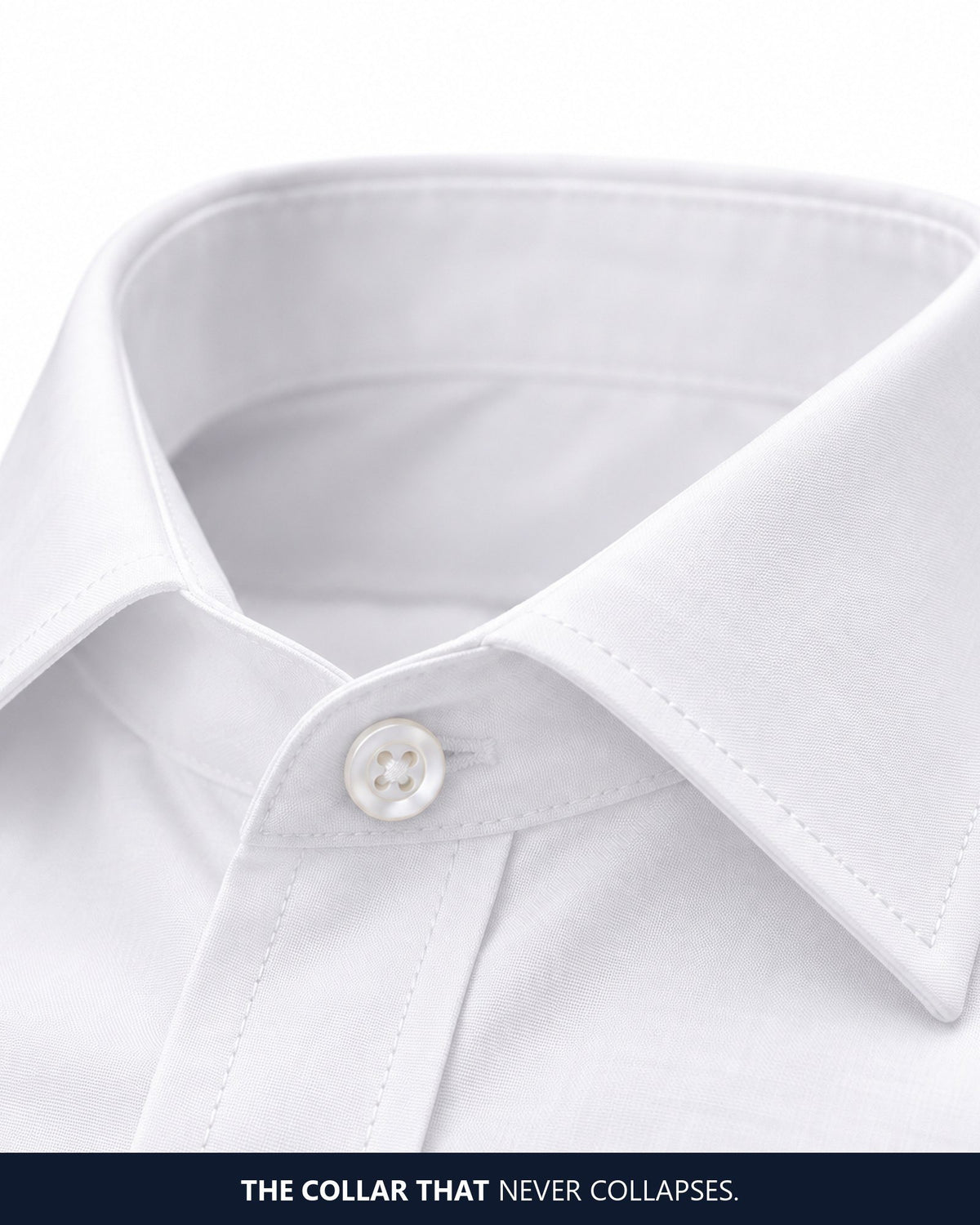 Close-up of the spread collar and top button